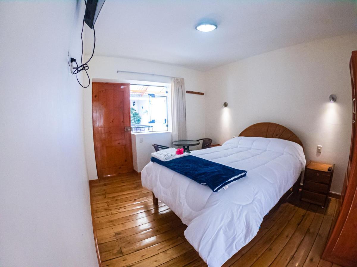 Hotel Los Laureles Calca ภายนอก รูปภาพ